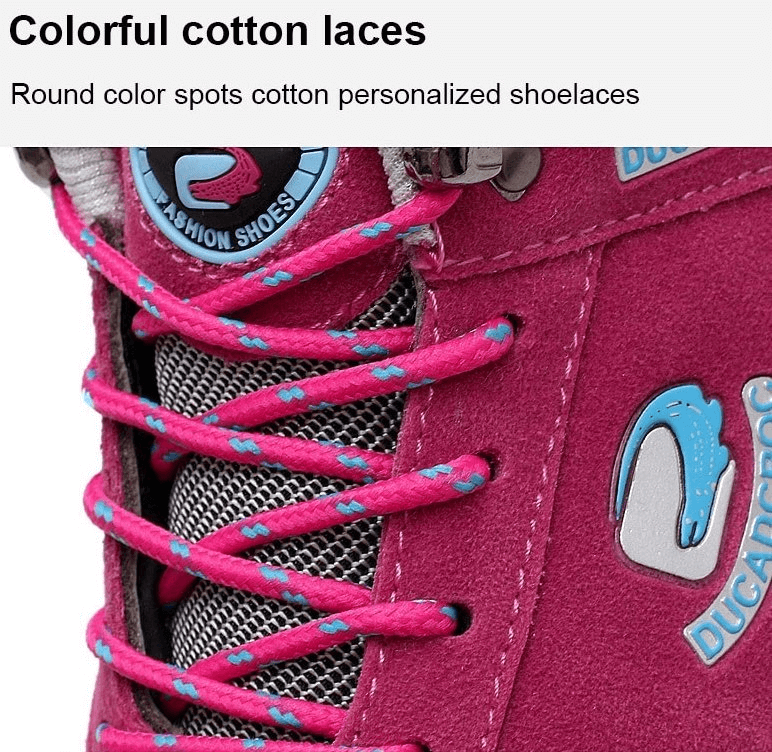 Colorful cotton laces on pink suede women's sports shoe with animal print. Close-up of lace-up detail and personalized shoelaces.